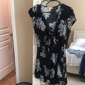 Black with white flowers romper. Tie front
